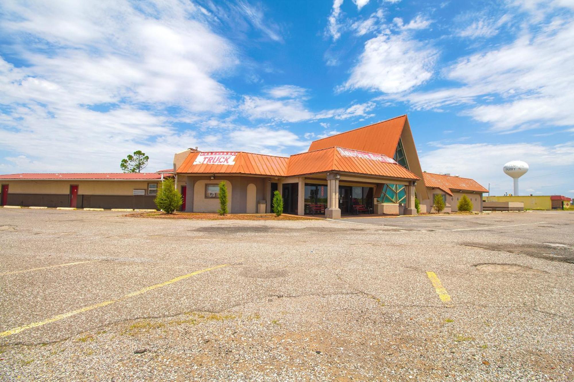American Best Inn By Oyo I-35 Perry Near Lake Mcmurtry Экстерьер фото